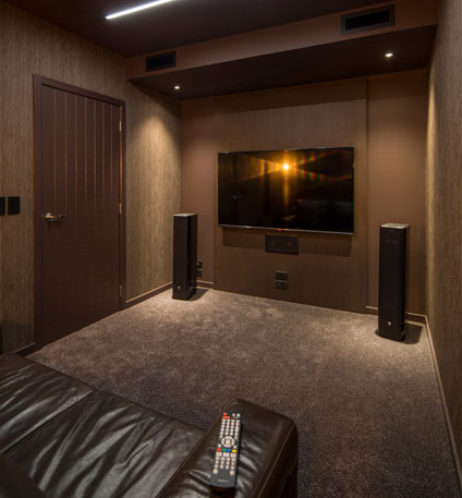 Premium home theatre system with 5.1 surround sound and projector installation in Menlo Park, Pretoria luxury home